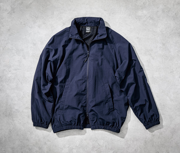 コットンライク ナイロン トレーニング ジャケット(裏地付)|7220-01|United Athle